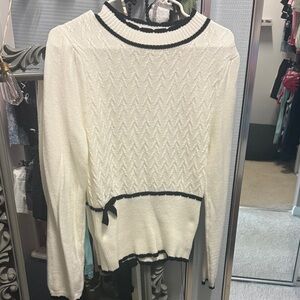 White Sweater with Black Trim